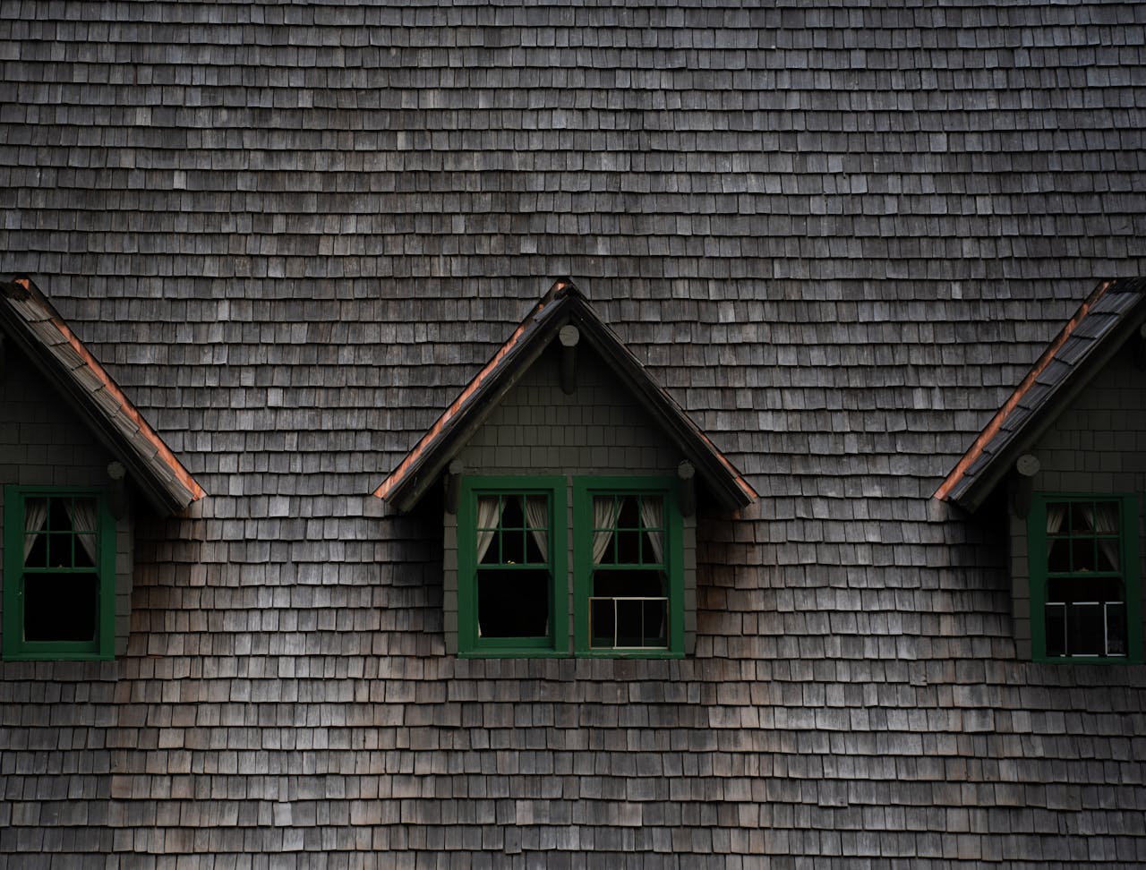 Offerings Close-up of a historic building with three charming dormer windows in Washington, USA.